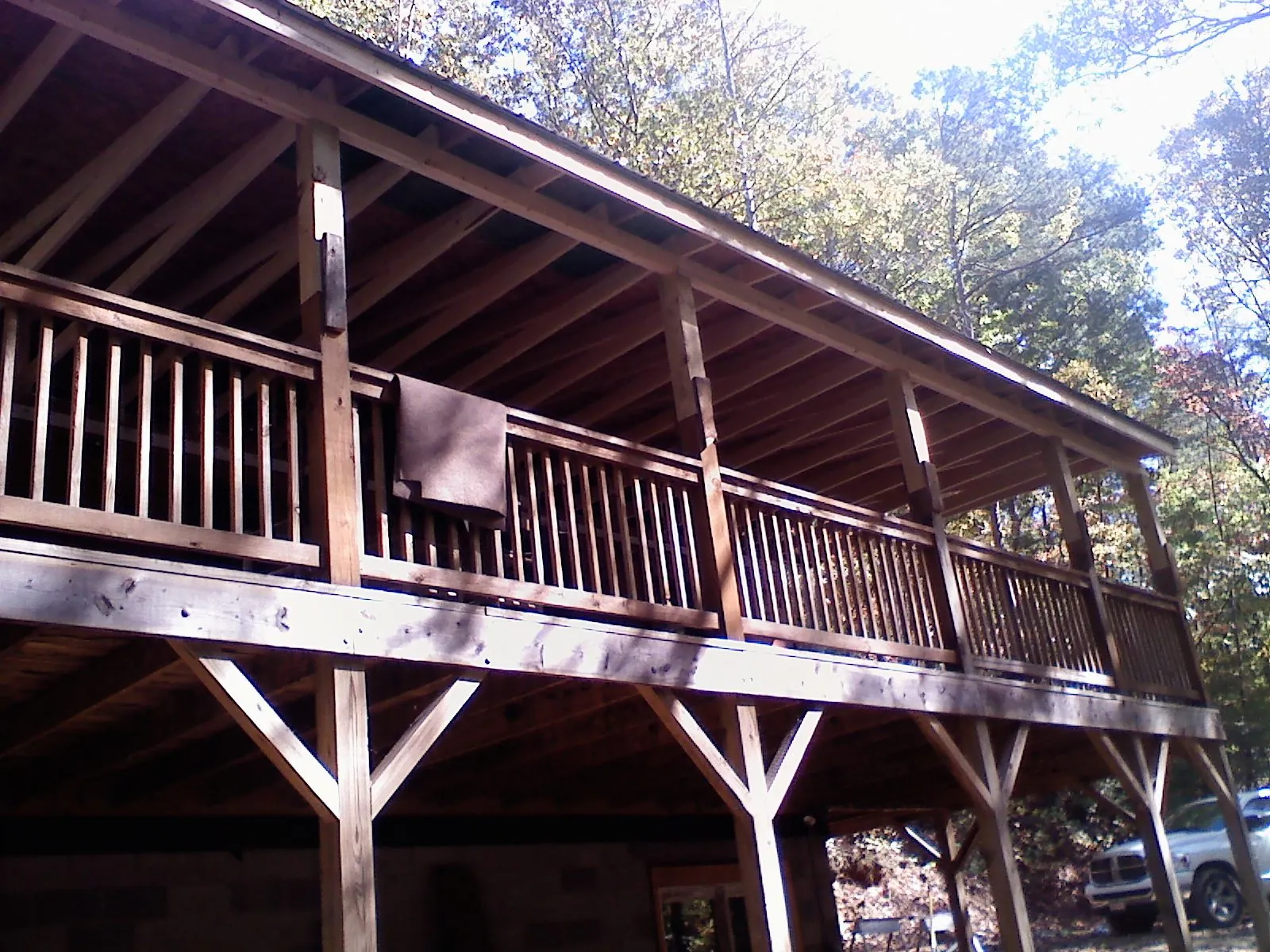 Timber framing under a new elevated porch and deck — Roof Leak Repair in Kennesaw by Roofing Brothers